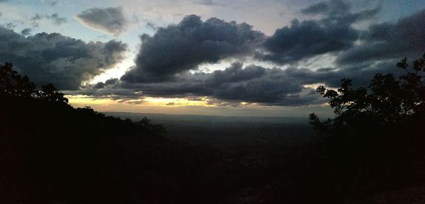 Scenic view of dramatic sky during sunset