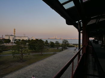 View of bridge over river at sunset