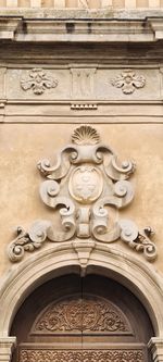 Low angle view of carving on old building