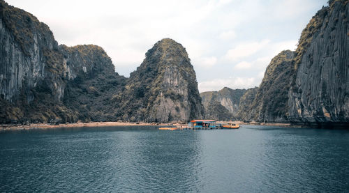 Scenic view of sea and rocks against sky