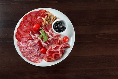 High angle view of fruits in bowl on table