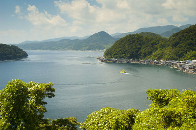 Scenic view of bay against sky