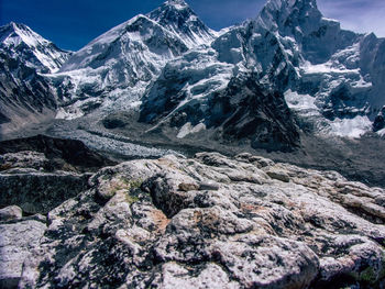 Scenic view of snowcapped mountains against sky