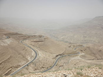 High angle view of road passing through desert