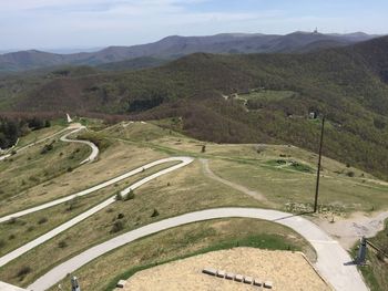 Landscape with mountain range in background