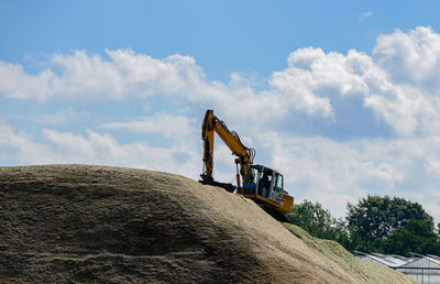 Low angle view of crane at construction site