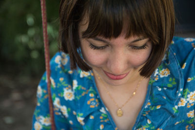 Portrait of young woman smiling