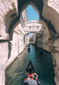 People on bridge over canal