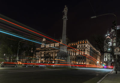 Light trails on road by supreme court of argentina at night