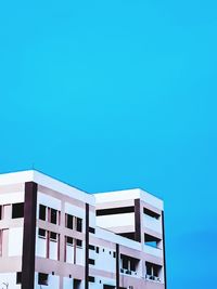 Low angle view of building against blue sky