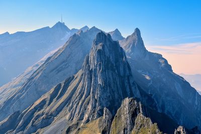 Panoramic view of snowcapped mountains against sky