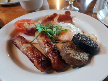 High angle view of meat in plate on table