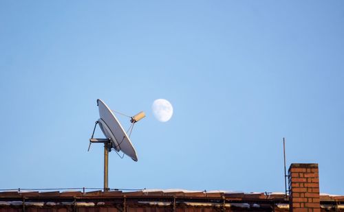 Antenna against clear blue sky