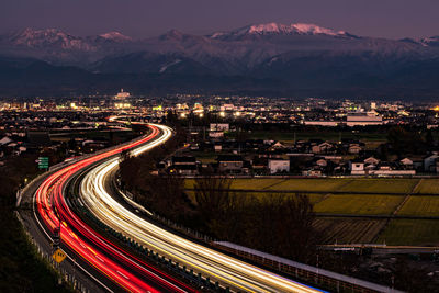 High angle view of illuminated city at night