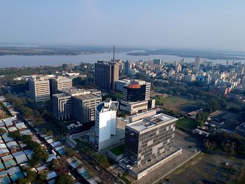 High angle view of buildings in city against sky