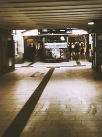 View of railroad station platform at night