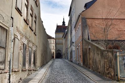 Narrow alley along buildings