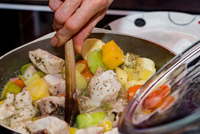 Close-up of person preparing food