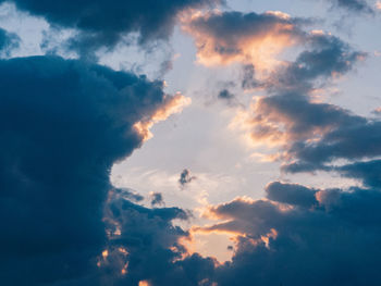 Low angle view of clouds in sky during sunset