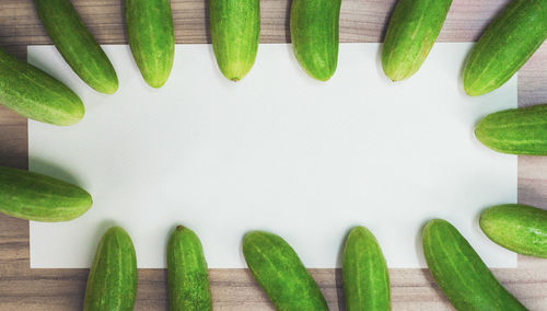 Directly above shot of chopped vegetables against white background