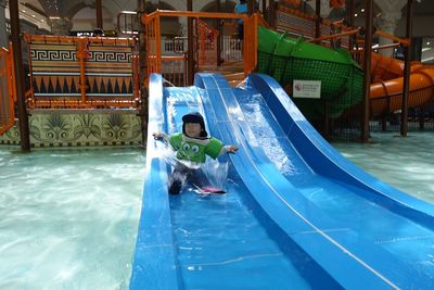 Full length of boy in swimming pool