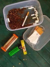 High angle view of cigarette on table