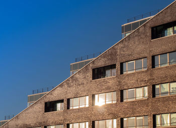 Low angle view of building against clear sky