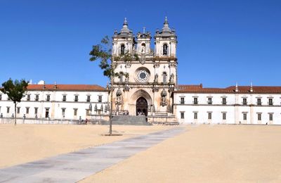 Facade of historic building against blue sky