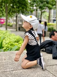 Full length of girl wearing hat