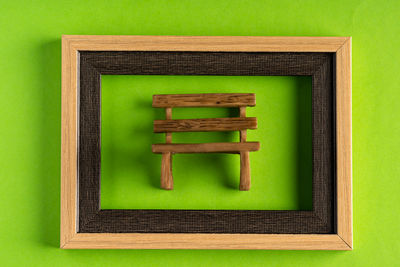 Directly above shot of green box on wall