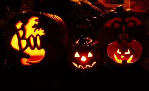 Close-up of illuminated halloween pumpkin at night