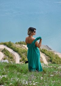 Woman standing on field