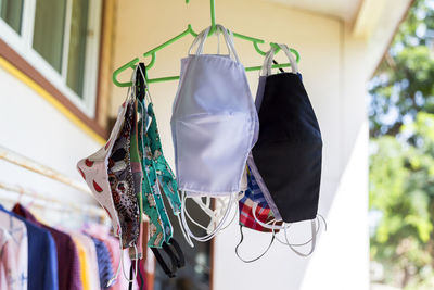 Low angle view of clothes hanging on rack