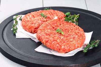 High angle view of meat in plate on table