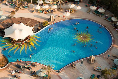 High angle view of people at swimming pool