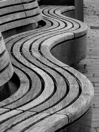 Close-up of curvy wooden bench