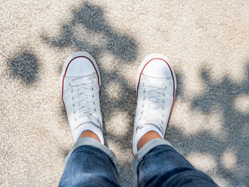 Low section of person standing on floor