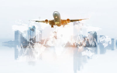 Digital composite image of airplane flying in sky