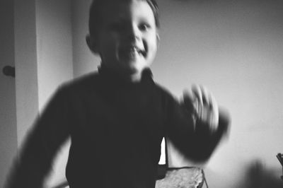 Boy standing in bathroom