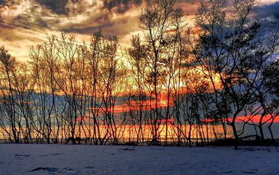 Scenic view of landscape against sky during sunset