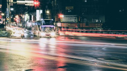 Light trails on city street at night