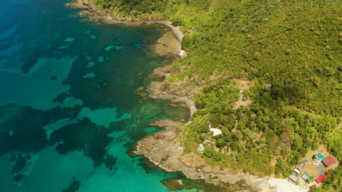 Turquoise water in the lagoon with coral reef. seascape island and clear blue water 