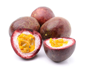 Close-up of fruits against white background