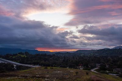 Scenic view of landscape against sky at night