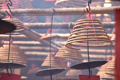 Close-up of lighting equipment hanging at market