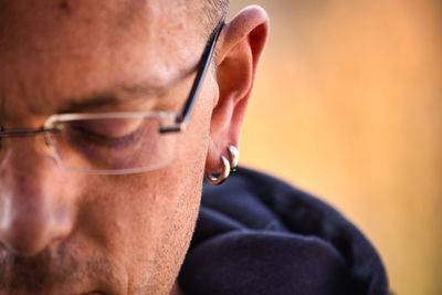 Close-up of man wearing eyeglasses