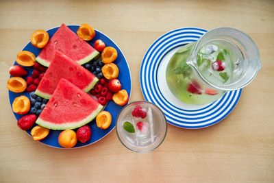 High angle view of fruits in plate on table