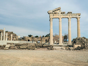 Old ruins against sky in city