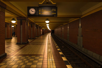 Train at railroad station at night