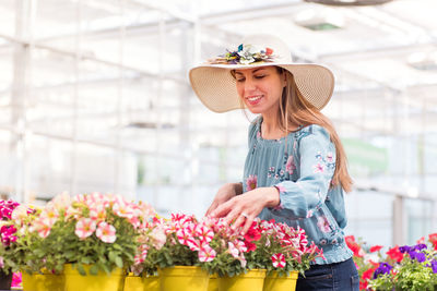 Young woman holding flower bouquet